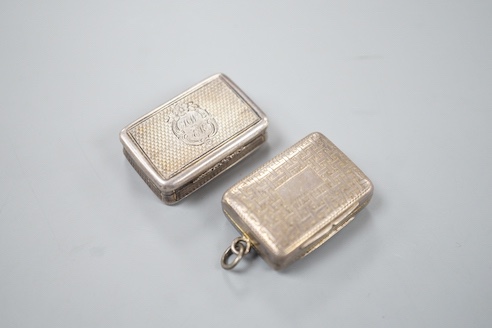 A William IV engraved silver rectangular vinaigrette, with interwoven decoration, TS, Birmingham, 1831, 32mm and a later silver vinaigrette, Birmingham, 1863.